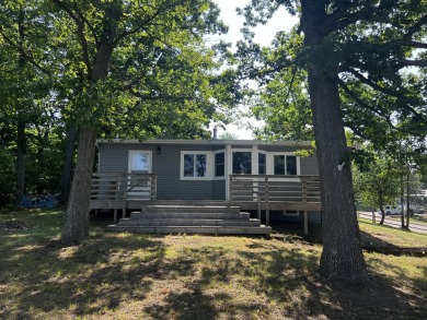 Lake Home Sale Pending in Saint Helen, Michigan