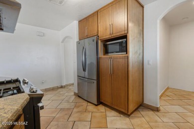 ''Nestled on a hilltop in Central Rio Rico, this charming home