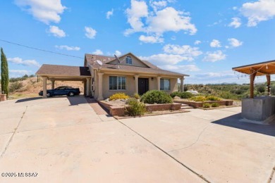 ''Nestled on a hilltop in Central Rio Rico, this charming home