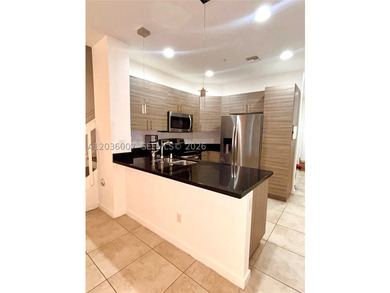 Beautifully updated townhouse featuring a private garage and a - photo 3