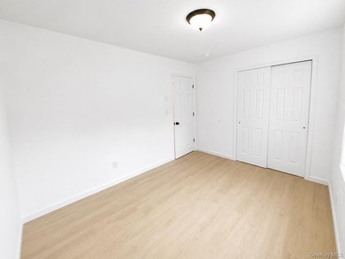 LIVING LUXURY In The Heart Of Bellport! This Ranch Style Home Is - photo 11