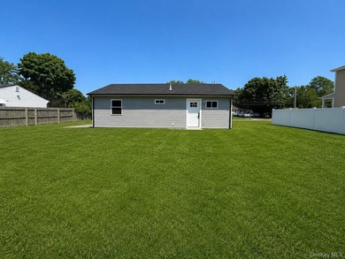 LIVING LUXURY In The Heart Of Bellport! This Ranch Style Home Is - photo 12