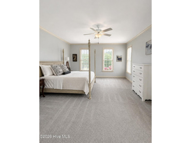 A picturesque tree-lined driveway welcomes you home, setting the - photo 24