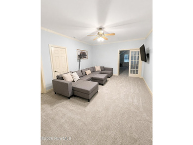 A picturesque tree-lined driveway welcomes you home, setting the - photo 29