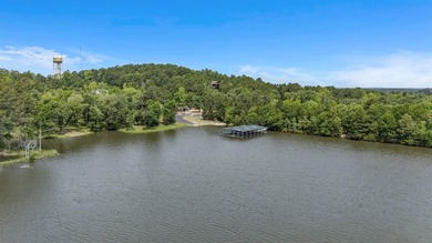 Lake life is calling! This beautiful corner, waterfront lot in - photo 17