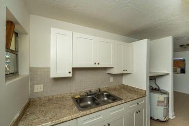 Fantastic income-producing duplex in the rapidly growing area of - photo 8