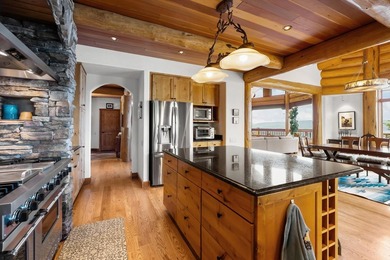 Located at the end of the road, this custom log home is perched - photo 11
