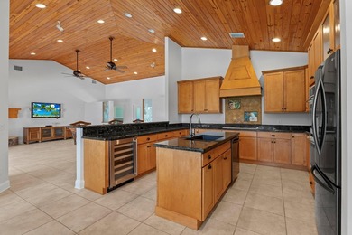 Experience timeless luxury and laid-back elegance on this gated - photo 16
