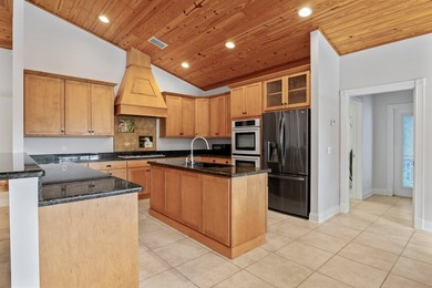 Experience timeless luxury and laid-back elegance on this gated - photo 17