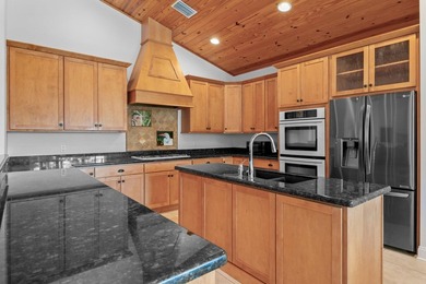 Experience timeless luxury and laid-back elegance on this gated - photo 18