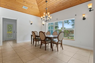 Experience timeless luxury and laid-back elegance on this gated - photo 19