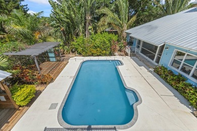 Experience timeless luxury and laid-back elegance on this gated - photo 57
