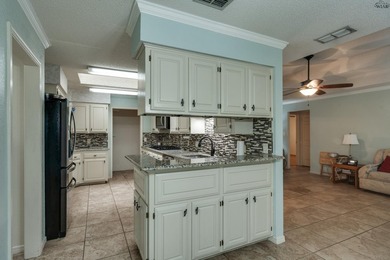 Welcome home to this updated Sikes Estates property featuring a - photo 11