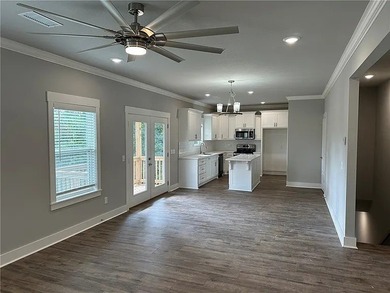 Like-new and packed with lifestyle! Built in 2023, this stunning - photo 4