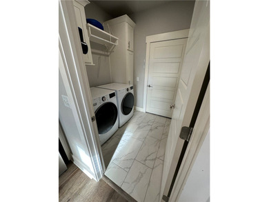 Like-new and packed with lifestyle! Built in 2023, this stunning - photo 6