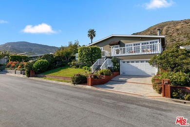 Located in the famed Upper Broad Beach area of Malibu, this - photo 2