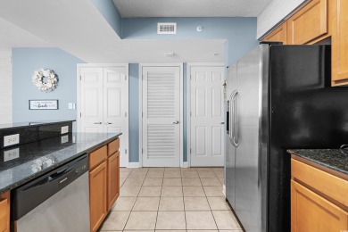 Discover your coastal oasis in this charming second-row condo