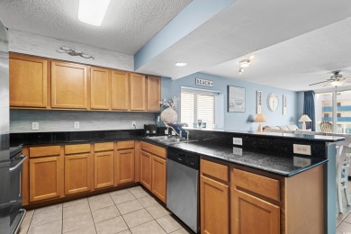 Discover your coastal oasis in this charming second-row condo