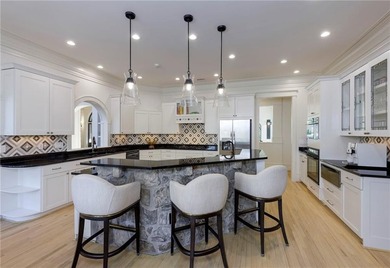 Beautifully updated, this one-of-a-kind property features a - photo 14