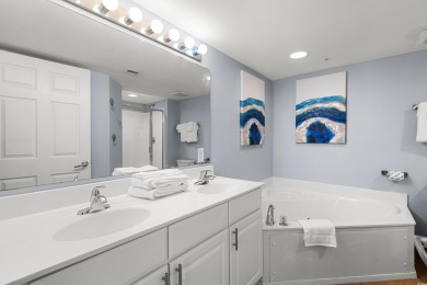 Discover your coastal oasis in this charming second-row condo