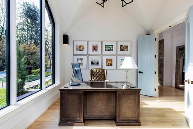 Beautifully updated, this one-of-a-kind property features a - photo 18