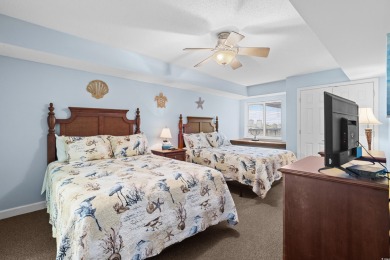 Discover your coastal oasis in this charming second-row condo