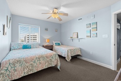 Discover your coastal oasis in this charming second-row condo