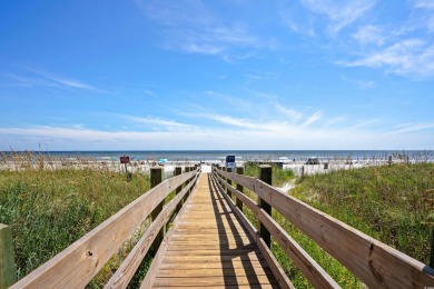 Discover your coastal oasis in this charming second-row condo