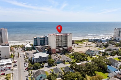 Discover your coastal oasis in this charming second-row condo