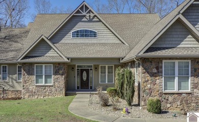 Experience lake living in this beautifully designed 4 bedroom, 3 - photo 2