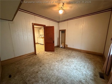 Step into this abundance of potential! This two bed one bath - photo 11