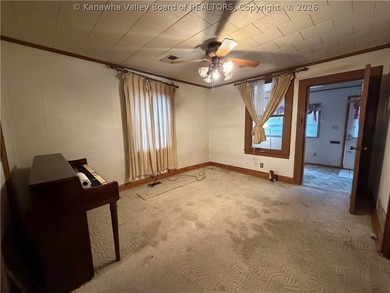 Step into this abundance of potential! This two bed one bath - photo 13