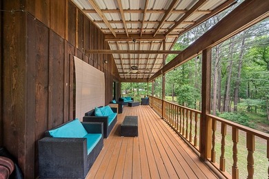 Escape to this charming 3-bedroom, 2-bath lake house nestled in - photo 15