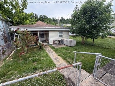 Step into this abundance of potential! This two bed one bath - photo 25