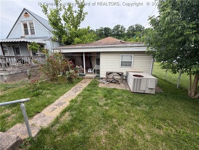 Step into this abundance of potential! This two bed one bath - photo 26
