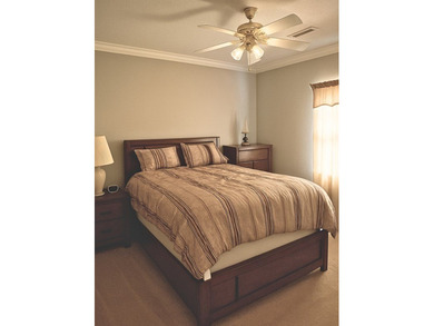 Tour this well-maintained 3BR/2BA custom brick home located in