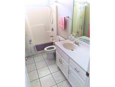 Tour this well-maintained 3BR/2BA custom brick home located in