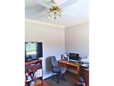 Tour this well-maintained 3BR/2BA custom brick home located in