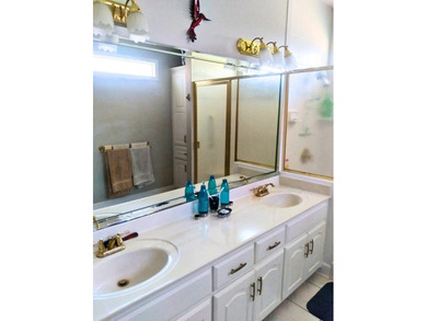 Tour this well-maintained 3BR/2BA custom brick home located in