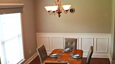 Tour this well-maintained 3BR/2BA custom brick home located in