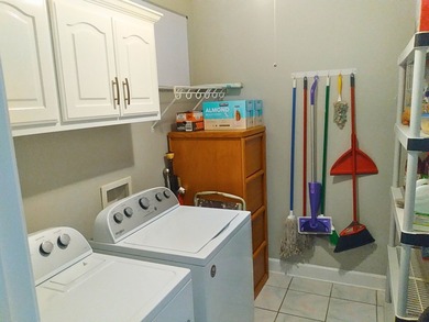 Tour this well-maintained 3BR/2BA custom brick home located in