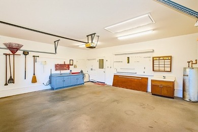 Tour this well-maintained 3BR/2BA custom brick home located in