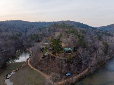 A 280-foot canyon drop from mountain ridge to river, anchored by - photo 1