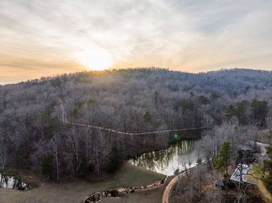A 280-foot canyon drop from mountain ridge to river, anchored by - photo 3