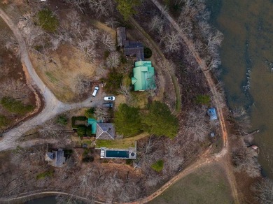 A 280-foot canyon drop from mountain ridge to river, anchored by - photo 4
