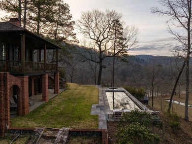 A 280-foot canyon drop from mountain ridge to river, anchored by - photo 6