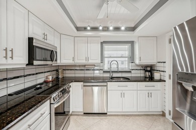 Experience relaxed coastal living in this furnished 2-bed - photo 11
