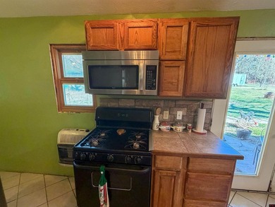 Minutes from Norfork, this 2-bedroom, 1-bath home features a - photo 11