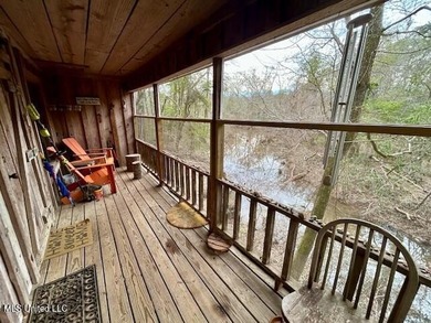 Secluded and peaceful, this charming 2-bedroom, 2-bath cabin - photo 3
