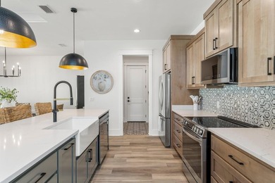 Welcome to your turnkey coastal haven at 322 Sea Breeze Drive, a - photo 12